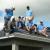 Getting more instruction on the roof top 